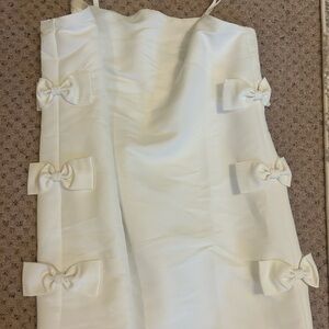 Elegant White Dress with Bow Accents